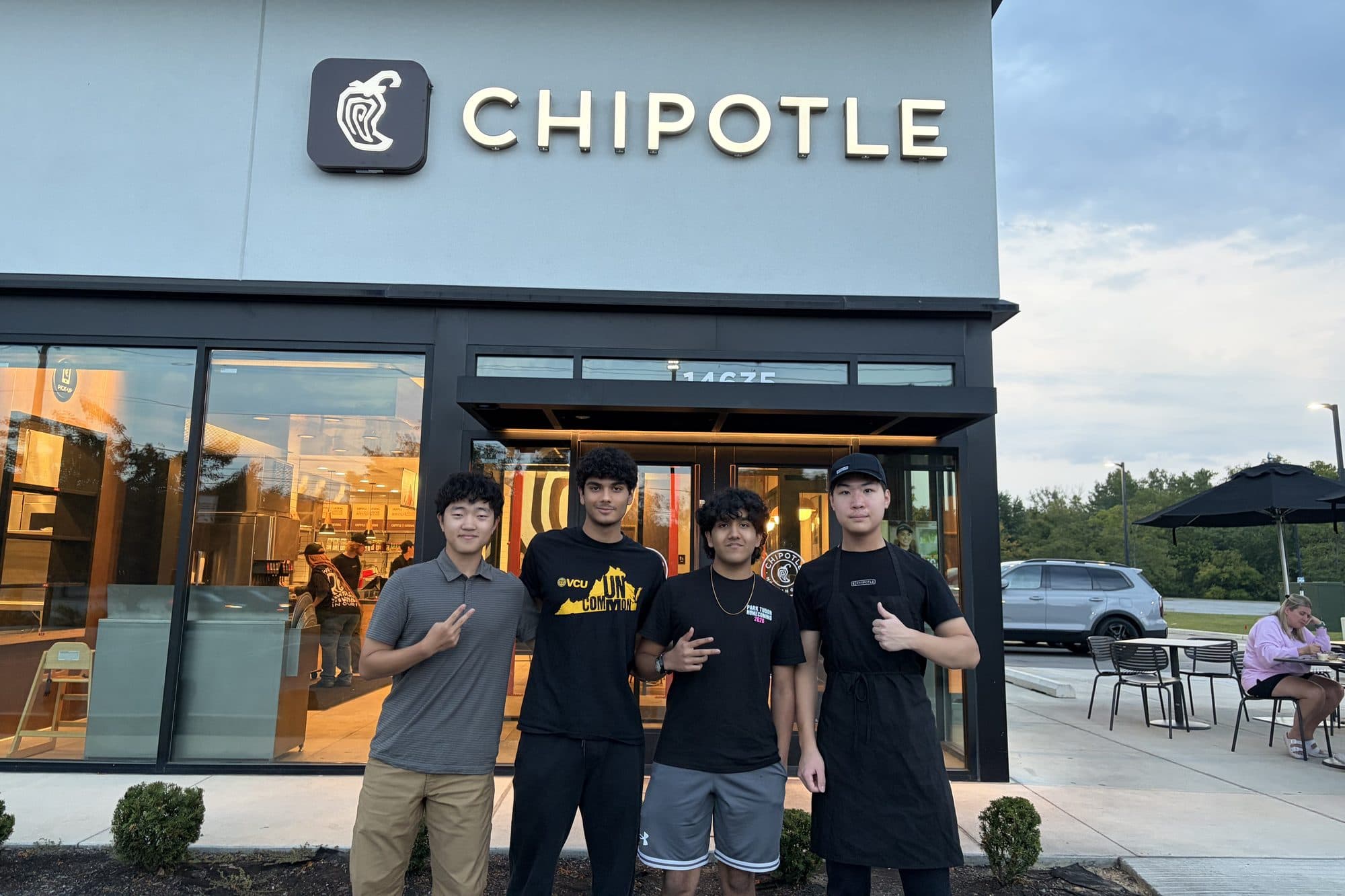 Four people outside the Chipotle at Hazel Dell Crossing in Noblesville, Indiana on the night of the ALS Forward fundraiser